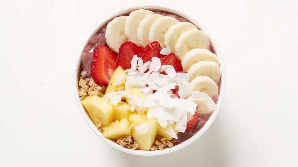 Acai Mango Bowl · An antioxidant-packed bowl with a tropical twist! Acai, banana, mango, and coconut water blended together and topped with hempseed granola, coconut flakes, and banana, topped with strawberry and pineapple. 520 cal