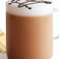Café White Chocolate · Our light roast coffee with our White Chocolate Dream® powder, steamed non-fat milk and topp...