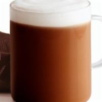 Café Dark Chocolate · Our light roast coffee with our dark chocolate powder, steamed non-fat milk and topped with ...
