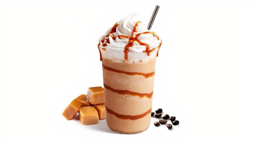 Pure Caramel Ice Blended® Drink · A decadent treat blended with French Deluxe™ vanilla powder, non-fat milk, caramel sauce, and our signature pebble ice and topped with whipped cream and caramel drizzle.