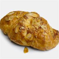Croissants|Almond Croissant · A sweet butter croissant filled with a moist almond filling and topped with sliced almonds. ...