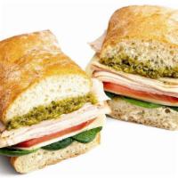 Sandwiches & Wraps|Turkey Pesto Sandwich · Turkey Pesto with provolone cheese, tomato and spinach on a ciabatta bun.  Great cold or war...