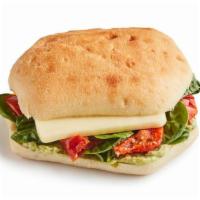 Sandwiches & Wraps|Caprese Sandwich · Sun blushed tomatoes, mozzarella, spinach and pesto dressing on an artisan roll. This has no...