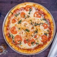 Margherita Pizza · Olive oil, basil, fresh garlic and sliced tomatoes.