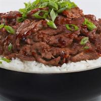 Steak Bowl · Grilled marinated rib-eye steak and served on a bed of rice.