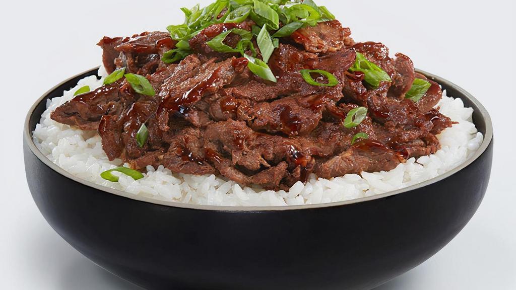 Steak Bowl · Grilled marinated rib-eye steak and served on a bed of rice.