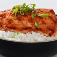 Salmon Bowl · Grilled wild-caught salmon served on a bed of rice and drizzled with our signature WaBa sauce.