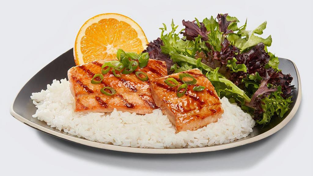 Salmon Plate · Grilled wild-caught salmon served on a bed of rice and drizzled with our signature WaBa sauce. Served on a bed of rice with Arcadian blend salad and seasonal fruit.