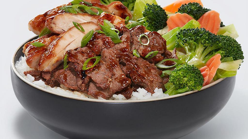 Chicken & Steak Veggie Bowl · A combination of all-natural grilled chicken and marinated rib-eye steak hand basted with our signature WaBa sauce. Served on a bed of rice with steamed veggies.