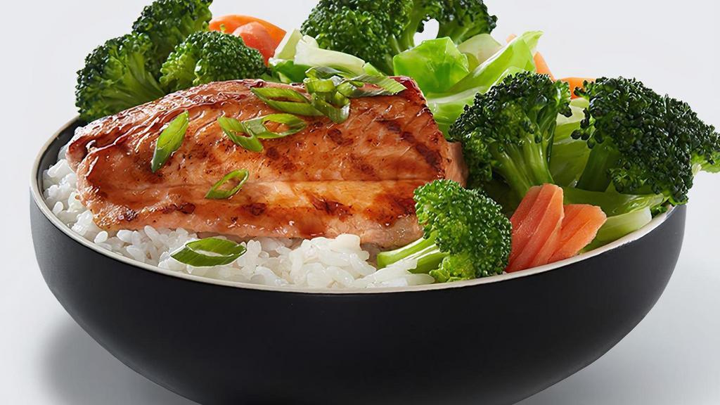 Salmon Veggie Bowl · Grilled wild-caught Salmon hand basted with our signature Waba sauce and served on a bed of rice with steamed veggies.