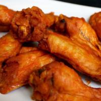 8Pc Chicken Wings  · Buffalo,  BBQ, CHIPOTLE BBQ  or blazing hot don't forget to pick you're sauce.