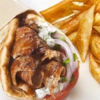 Gyro Sandwich · Spicy. Beef and lamb grounded together, lettuce, tomato, and tzaziki sauce.