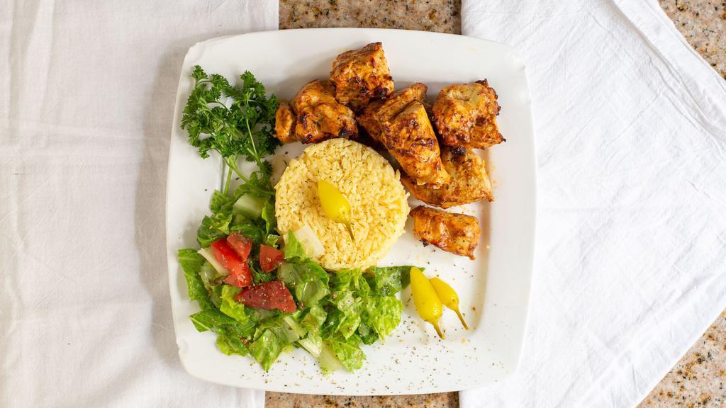 Chicken Kabab Plate · Spicy. Two grilled chicken skewers, marinated with garlic and herbs. Served with rice, hummus, salad, pita bread and garlic sauce.