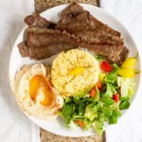 Gyro Plate · Spicy. Beef and lamb ground together and served with tzaziki sauce, hummus, salad, rice, and...