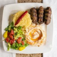 Kafta Kabob Plate (2 Skewers) · Two skewers of extra lean ground beef with chopped onions and parsley seasoned with a blend ...