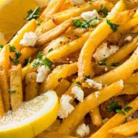 Greek Fries · Spicy. French fries topped with fata cheese and olive oil.