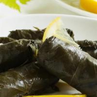 Grape Leaves · Spicy. 5 grape leaves stuffed with rice, tomato, onions, parsley and fresh lemon juice.