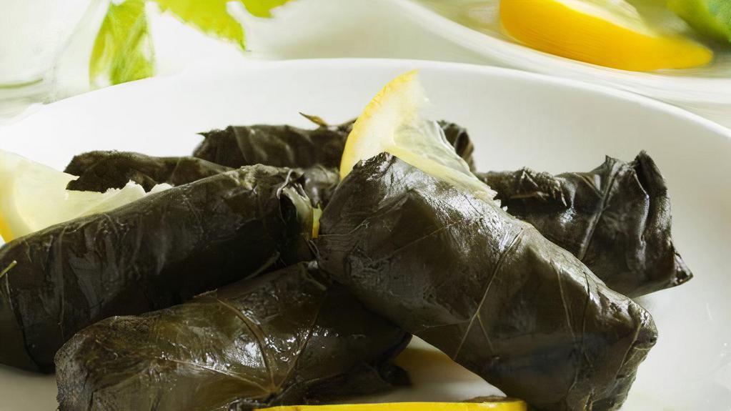 Grape Leaves · Spicy. 5 grape leaves stuffed with rice, tomato, onions, parsley and fresh lemon juice.