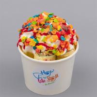 Fruity Rebels Ice Cream · Vanilla base with Fruity Pebbles inside, topped with Whipped Cream, Strawberry Syrup and mor...
