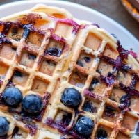 Blueberry Waffle · Blueberry base belgian waffle topped with fresh blueberries.