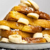 Banana French Toast · Gourmet sweet egg bread dipped in a homemade egg batter, lightly dusted with powdered sugar ...