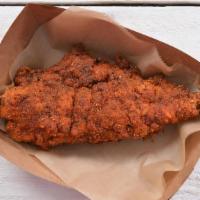 1 Jumbo Hot Chicken Tender · 1 of our famous, jumbo, hand-breaded chicken tenders drenched in Nashville Hot Sauce