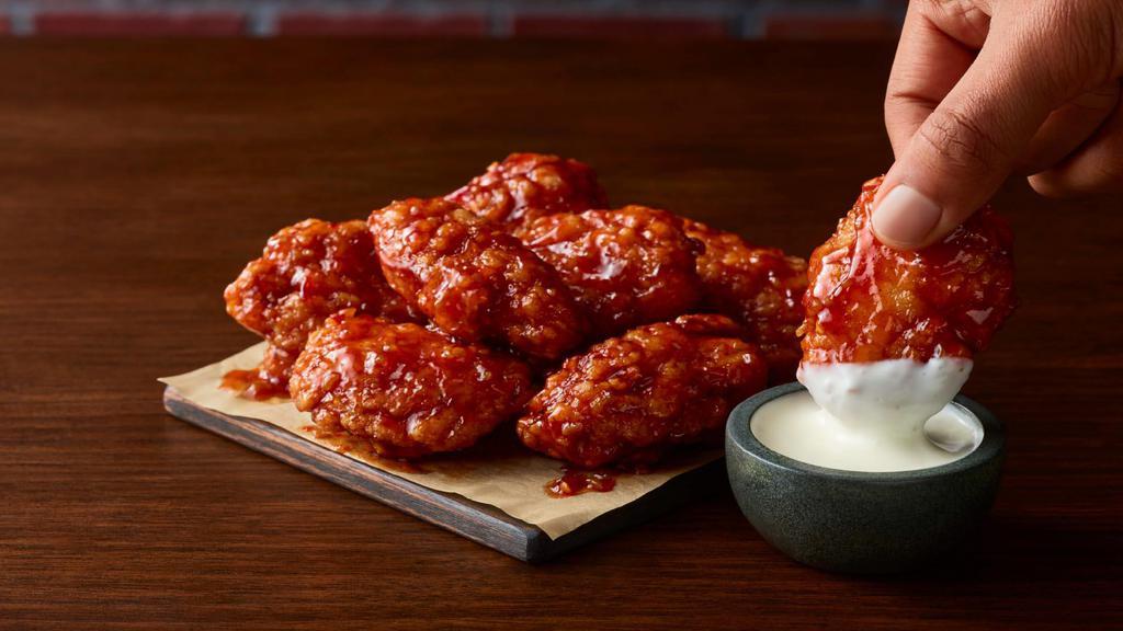 16 Breaded Boneless Wings · 100% all-white meat chicken wings covered in savory breading and your choice of sauce.