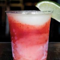 Frozen Strawberry Margarita · House Frozen Margarita blended with strawberry sauce.. Must be 21 to order, have your ID rea...
