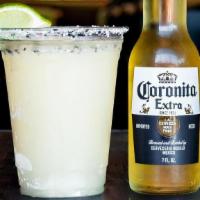 Skinny Dip · 7oz mini beer dunked into a goblet of House Frozen Margarita served with salted rim.. Must b...