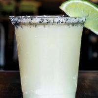 House Frozen Margarita · Gold tequila & triple sec with fresh citrus juices served frozen with salted rim.. Must be 2...