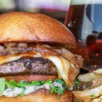 The Primetime · 1/2 lb HD Signature prime blend beef patty topped with fondue cheese, caramelized onions, ar...