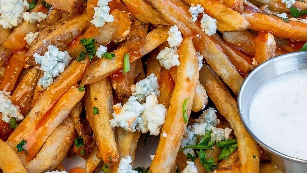 Buffalo Fries · Hand-cut fries tossed with buffalo sauce, topped with blue cheese crumbles & served with side of HD ranch. This item is gluten friendly.  If you have an allergy, please let the kitchen know.