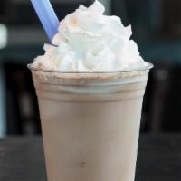Chocolate · Vanilla custard blended with dark chocolate sauce, topped with whipped cream. This item is g...