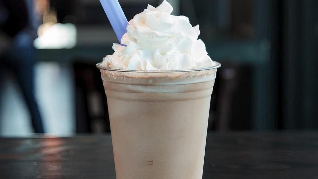 Chocolate · Vanilla custard blended with dark chocolate sauce, topped with whipped cream. This item is gluten friendly.  If you have an allergy, please let the kitchen know.
