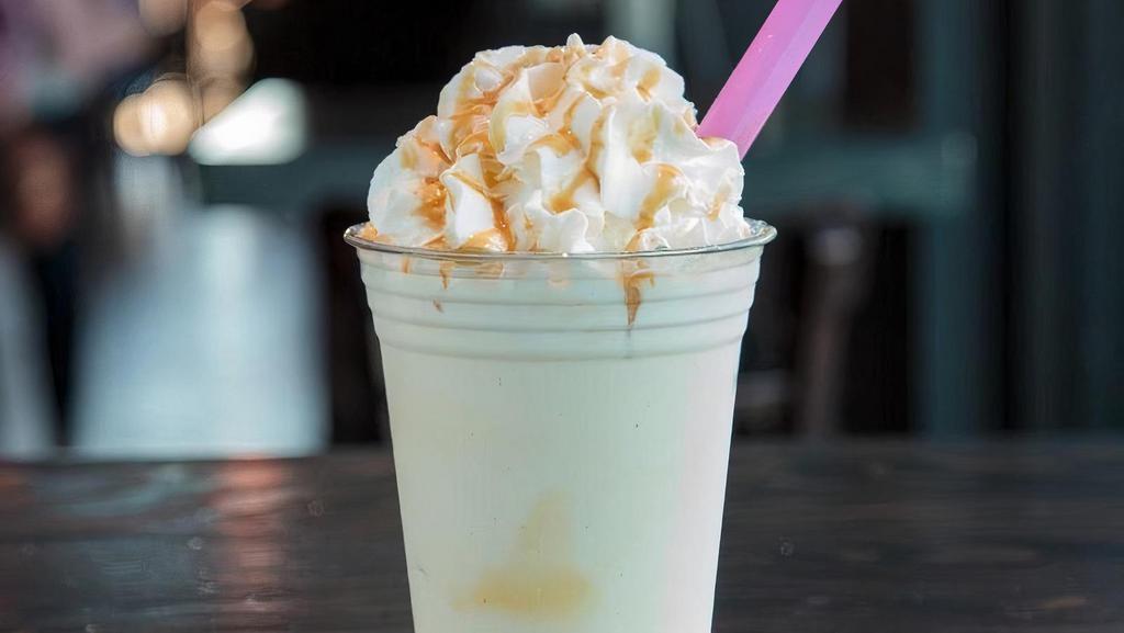 Salted Caramel · Our signature custard blended with salted caramel sauce & topped with whipped cream.