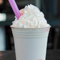 Strawberry · Vanilla custard blended with strawberry sauce, topped with whipped cream. This item is glute...