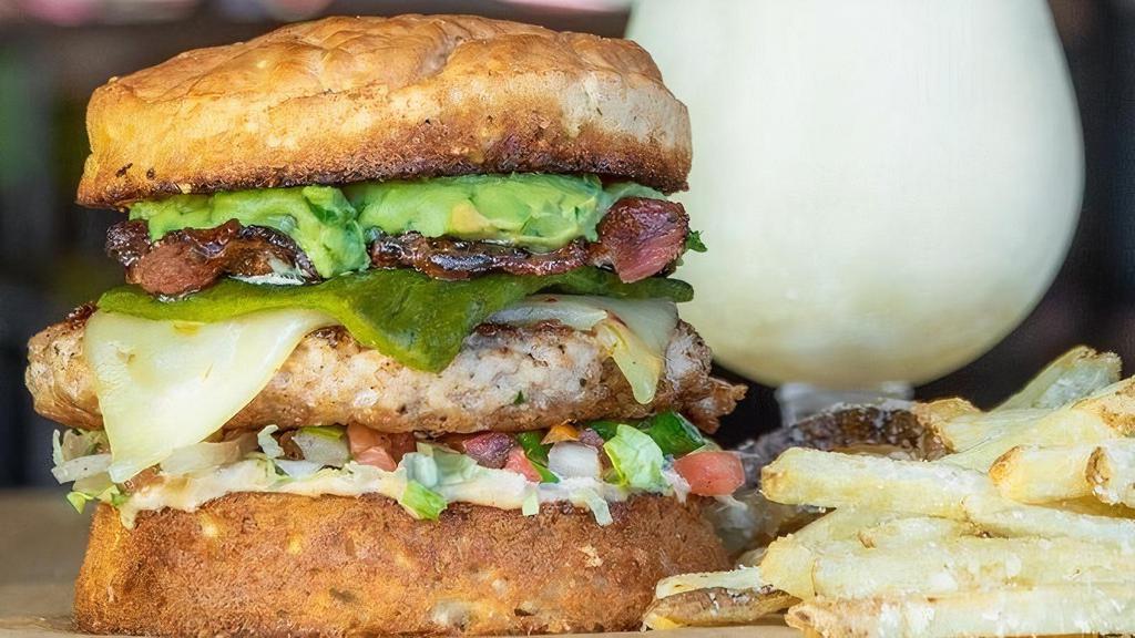 Gf- Thunderbird · Fresh ground chicken patty topped with pepper jack cheese, steakhouse bacon, seared poblanos, pico de gallo, guacamole, lettuce & chipotle aioli sauce.. This item is gluten friendly, if you have an allergy please let the kitchen know