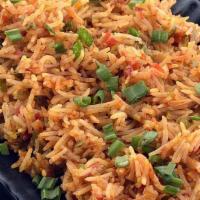Vegetable Fried Rice · Vegetarian. Stir-fried rice tossed in peas, carrots and veggies, seasoned with mild spices.
