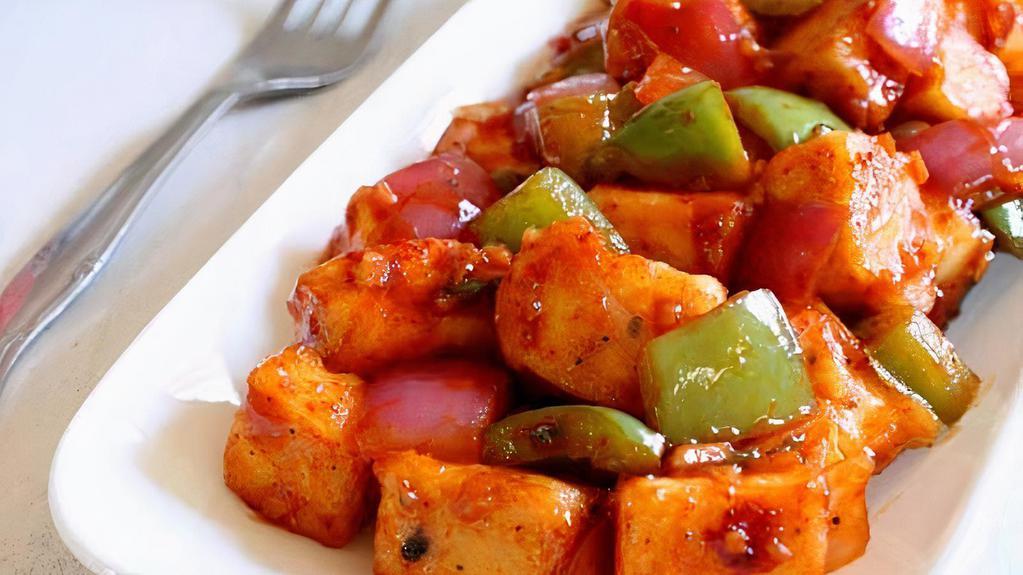 Chili Chicken · Spicy. Fried chicken chunks in sweet chili sauce, sautéed with onions and bell peppers.