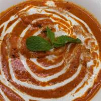 Chicken Tikka Masala · Chicken marinated in herbs and spices, barbequed over charcoal, and cooked in a creamy sauce.