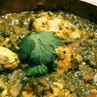Chicken Saag · Boneless chicken cooked with spinach and Indian spices.