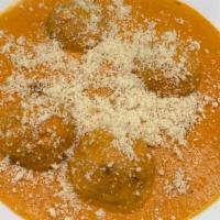 Malai Kofta · Vegetarian. Vegetable balls stuffed with paneer, potatoes, cashews and nuts, simmered in a c...