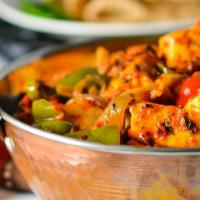 Kadhai Paneer · Vegetarian. Chopped bell peppers, tomatoes and onions tossed with Indian cottage cheese or p...