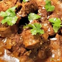 Lamb Curry · Boneless chunks of lamb cooked in a traditional curry sauce.