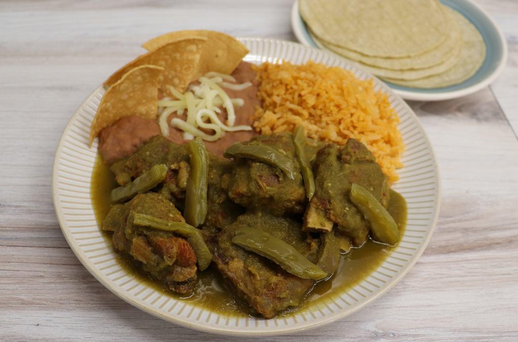 Costillas En Salsa Verde Plate · Pork ribs in green salsa. Served with rice, refried beans & tortillas.