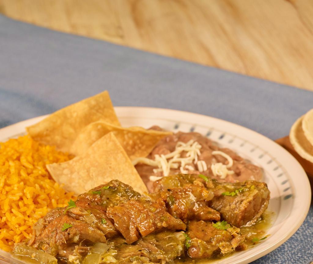 Carnitas Salsa Verde Plate · Pork carnitas in green salsa. Served with rice and refried beans & tortillas.