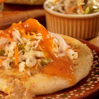 Pupusas · Served with pupusa salsa and pickled cabbage.