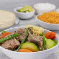 Caldo De Res · 24oz. Beef Soup served with rice, tortillas, cilantro, onions & lime.