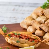 Tamales (Half Dozen) · 6 Tamales with choice of beef, pork, chicken, chile with cheese, or sweet corn