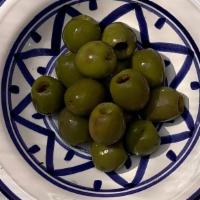Zaatar Olives · Green olives marinated in Zaatar